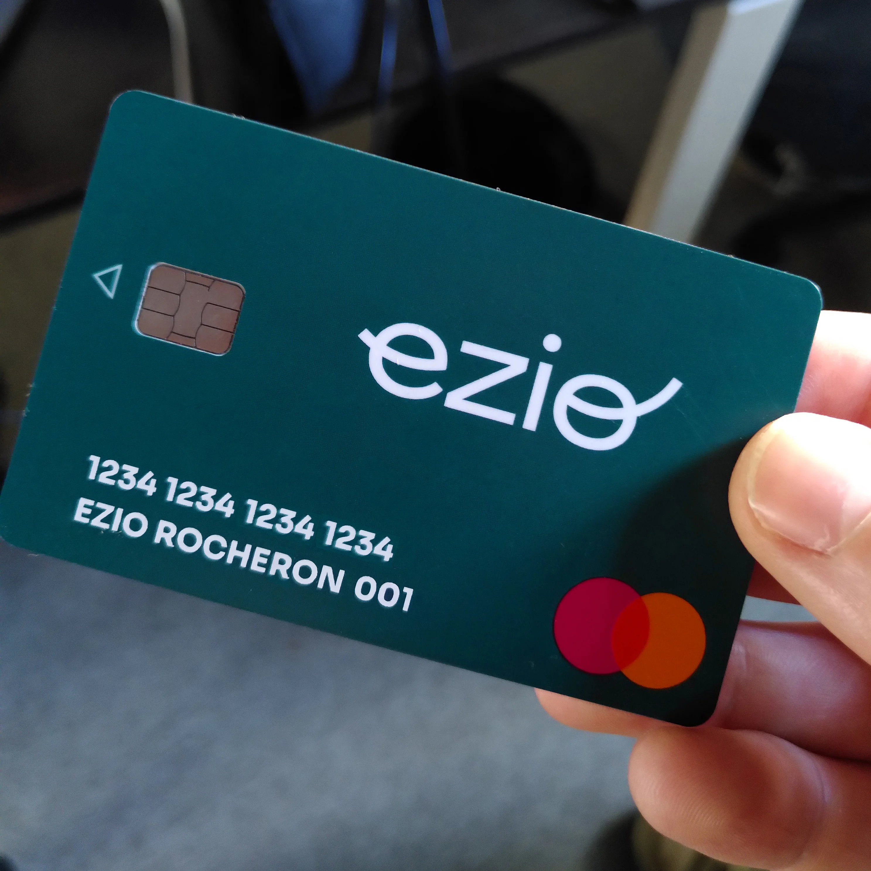 credit card flocked with Ezio's logotype